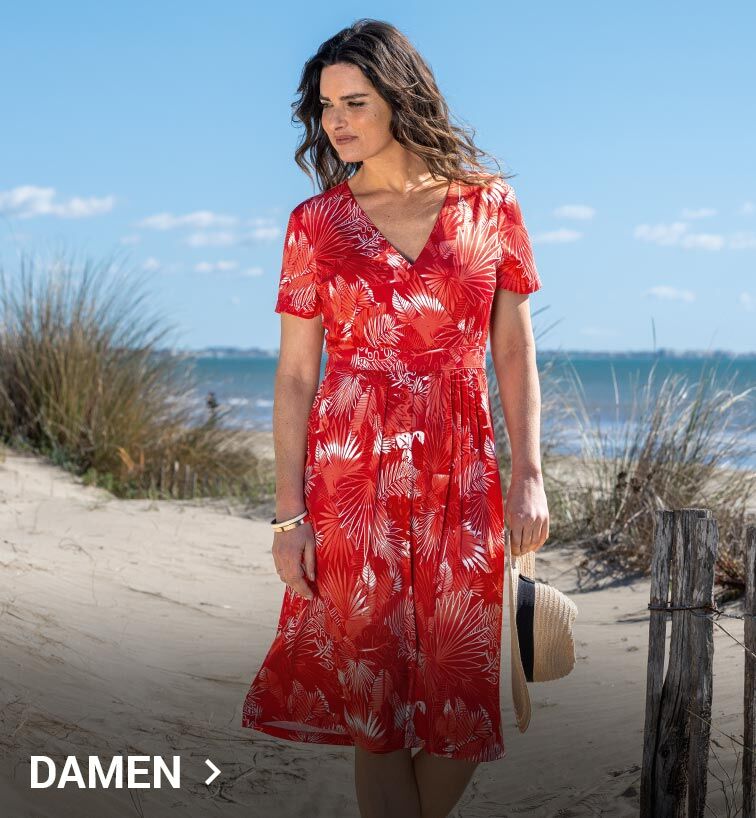 eine frau tragt ein rotes sommerkleid