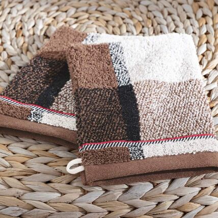 2 gants de toilette