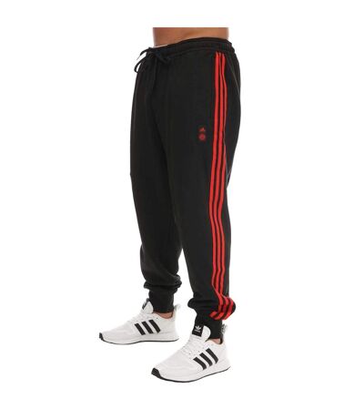 Pantalon de jogging lifestyler homme noir / rouge Adidas