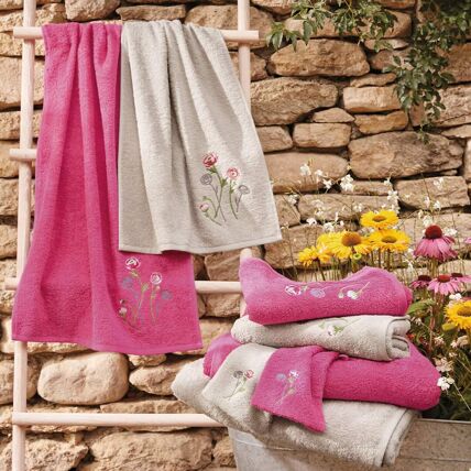 2 gants de toilette