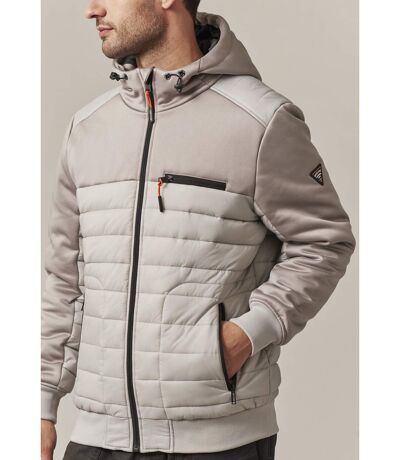 Blouson en bimatière, poche zippée sur la potrine, et 2 poches zippées devant, capuche, doublée en taffetas CEDAR