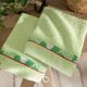 2 gants de toilette verts-1