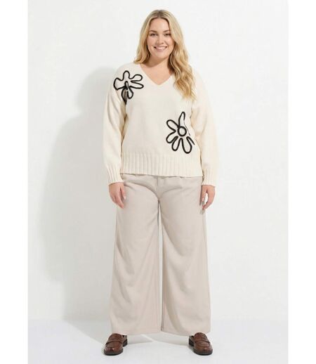 Pull col V applications fleurs