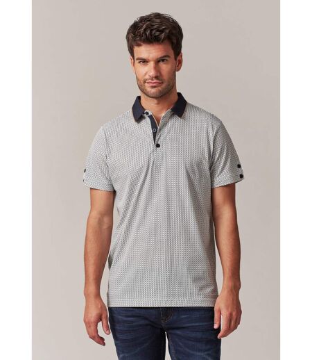 polo avec micro motif sur l'ensemble et col contrasté, bas de manches avec boutons HORUS