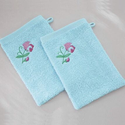 2 gants de toilette