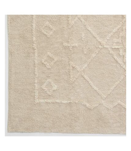 Tapis en coton tufté écru motifs ethniques 140 x 200 cm