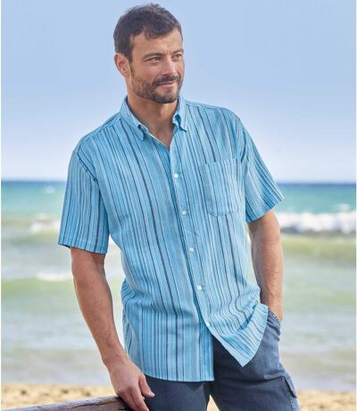 Niebieska, śródziemnomorska koszula z kreponu w paski