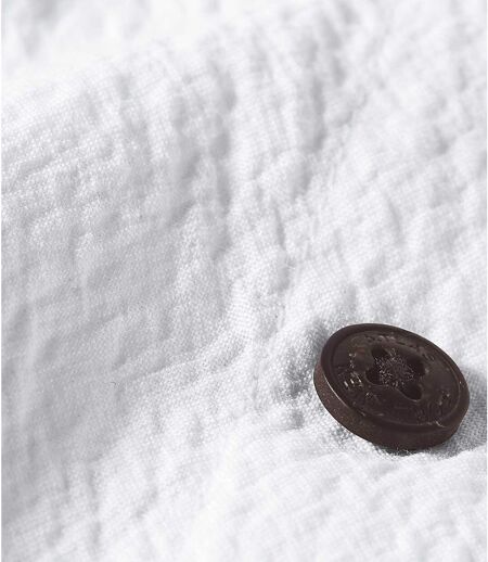 Biała koszula z tkaniny krepa
